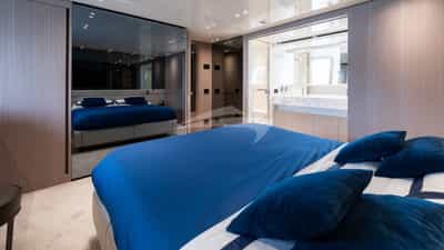 Master stateroom with large Smart TV