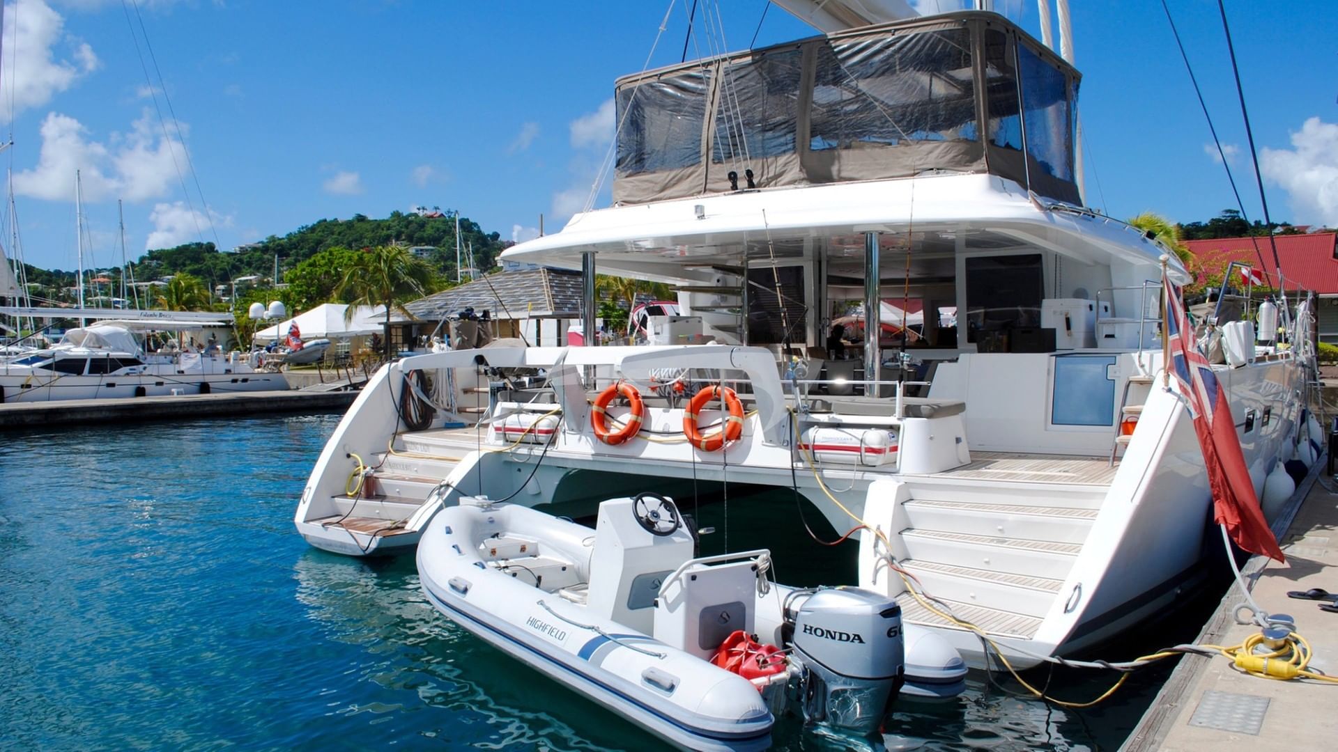 View of stern end at dock with dinghy