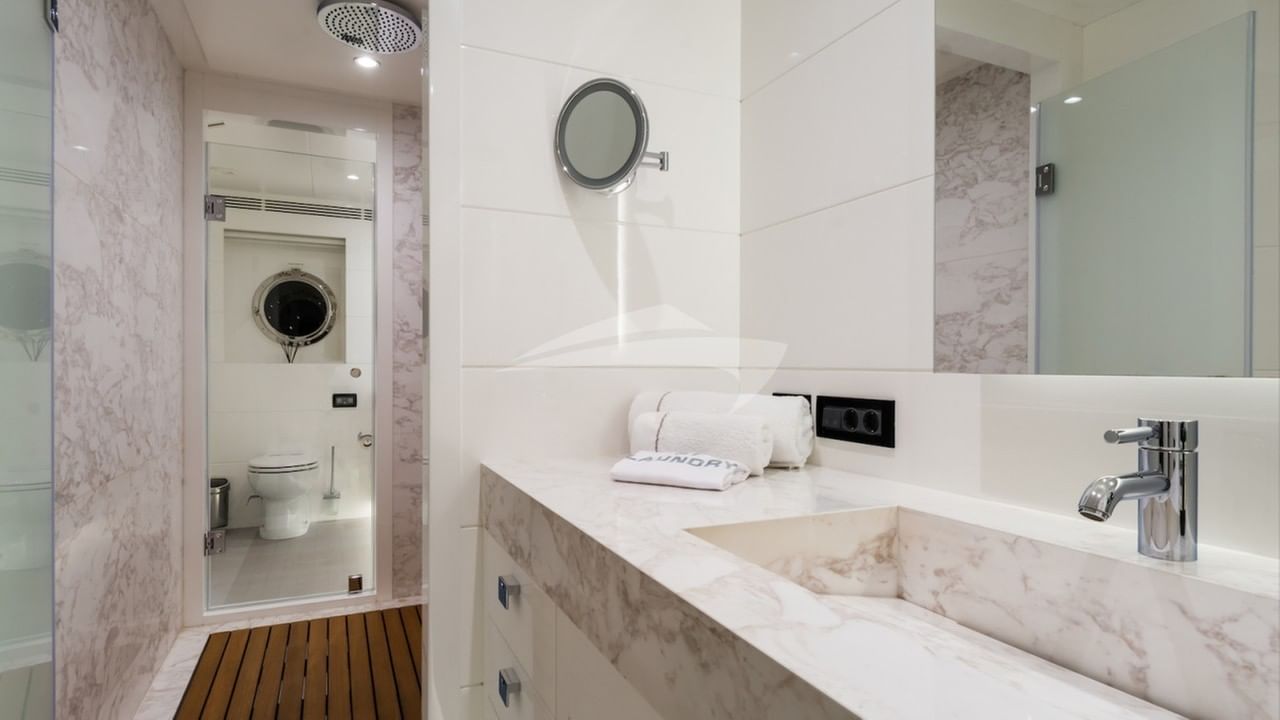 Master has his and her en suite with connecting shower