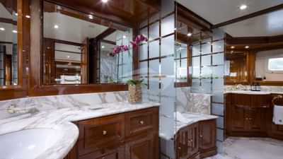Master stateroom is his and hers en suite with a shower
