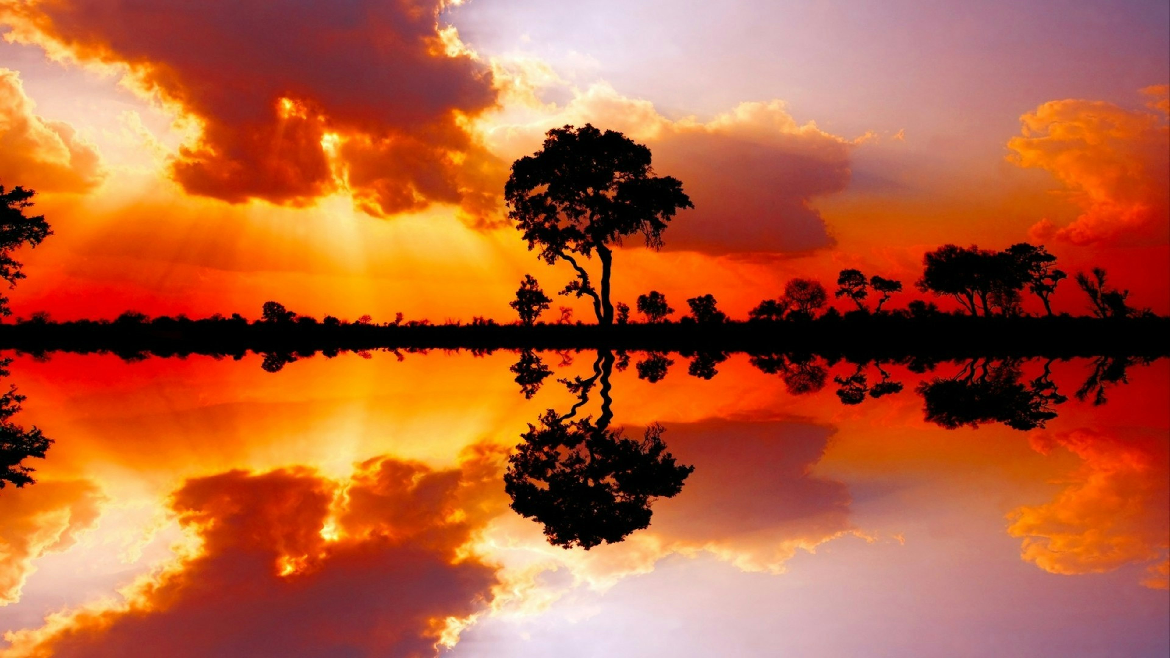 Beautiful African sunset reflected in water, in the Kruger National Park, South Africa
