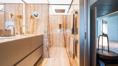 Master stateroom is en suite with his and hers sinks and shower