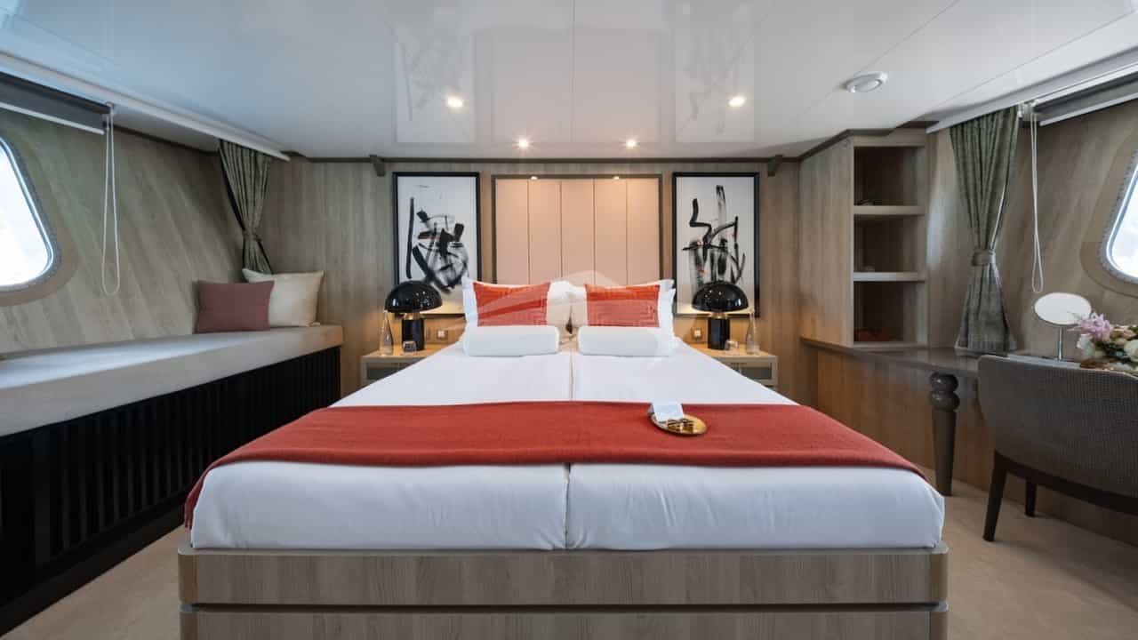 VIP full-beam master stateroom with a queen bed