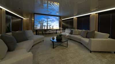 Main saloon lounge with cinematic screen