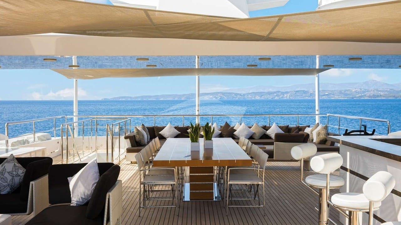 Sundeck lounge area, dining + bar