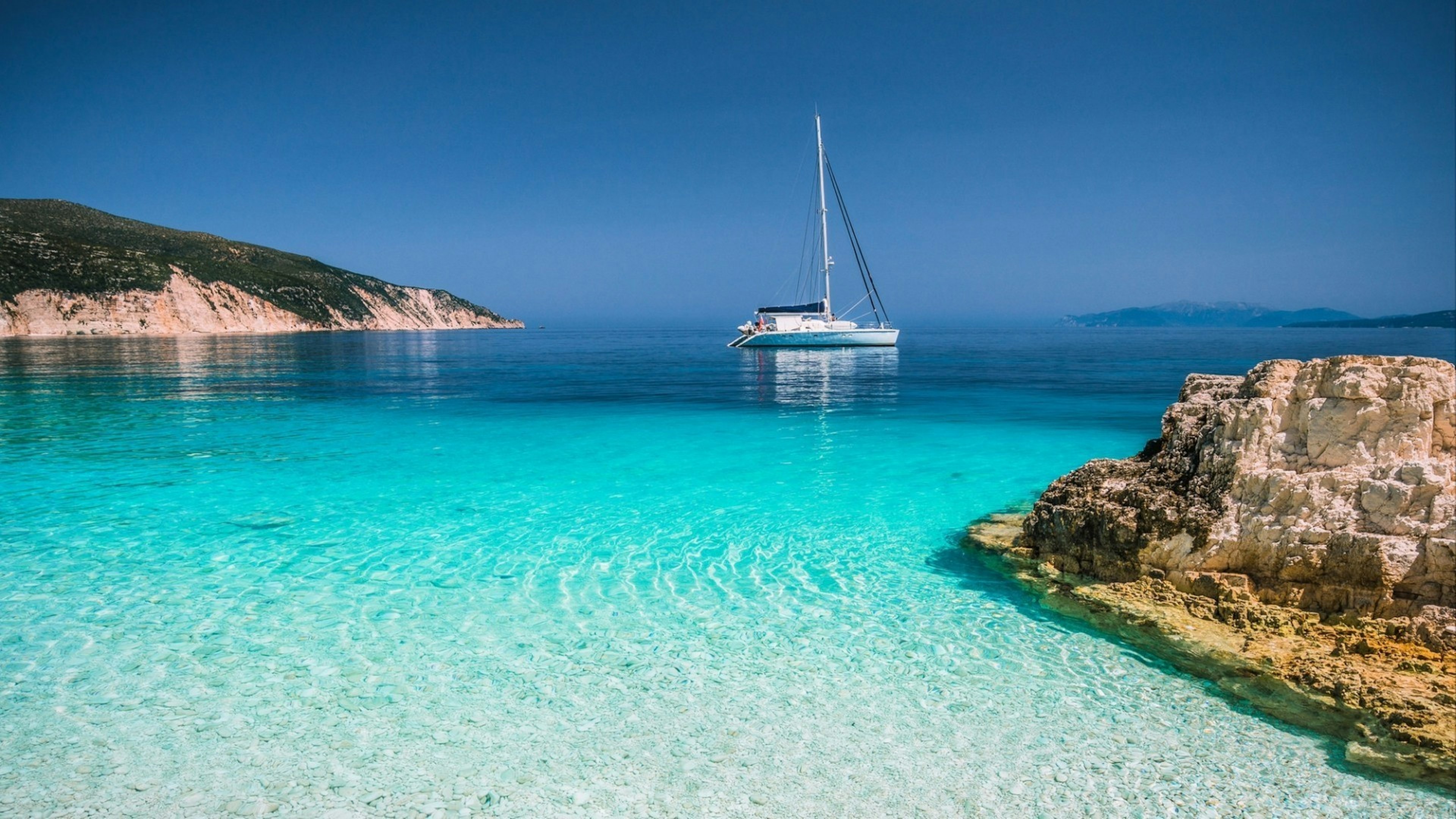 beautiful view of yacht off shore