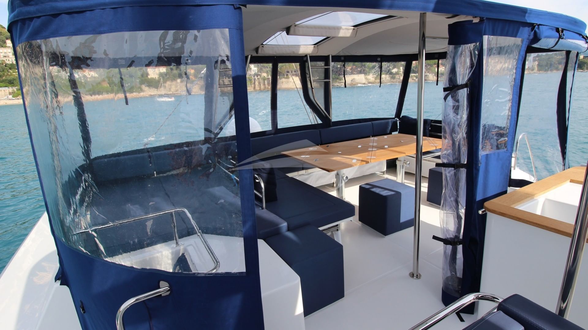 Flybridge Lounge can be fully enclosed for incleme