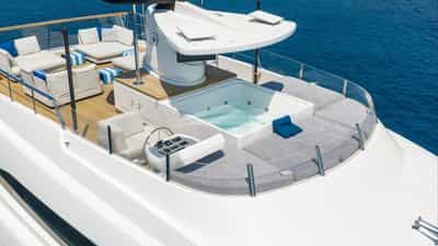 Jacuzzi on flybridge with 30" HD TV positioned above