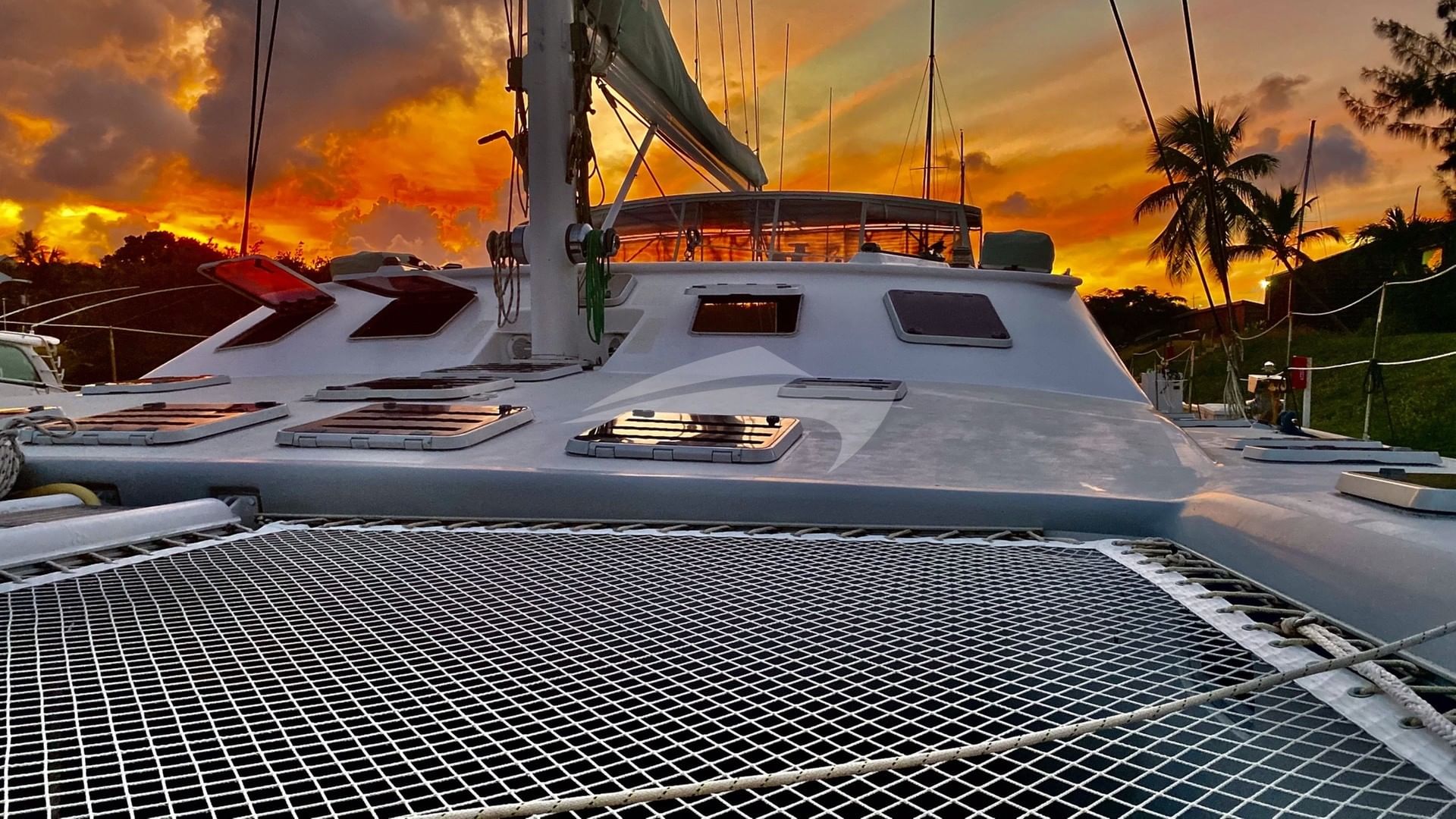 PURA VIDA's foredeck and the Bahamian sunset