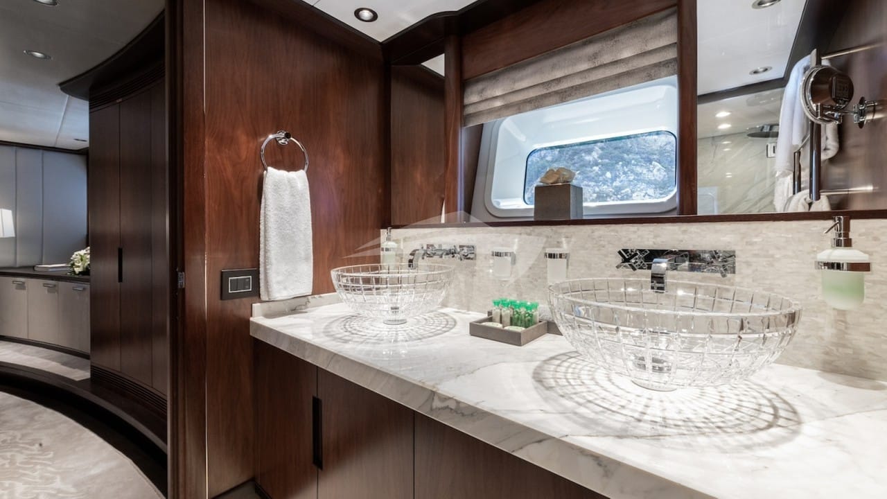 Master en suite with his and her sinks and a shower