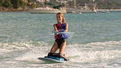 Kneeboarding behind the tender