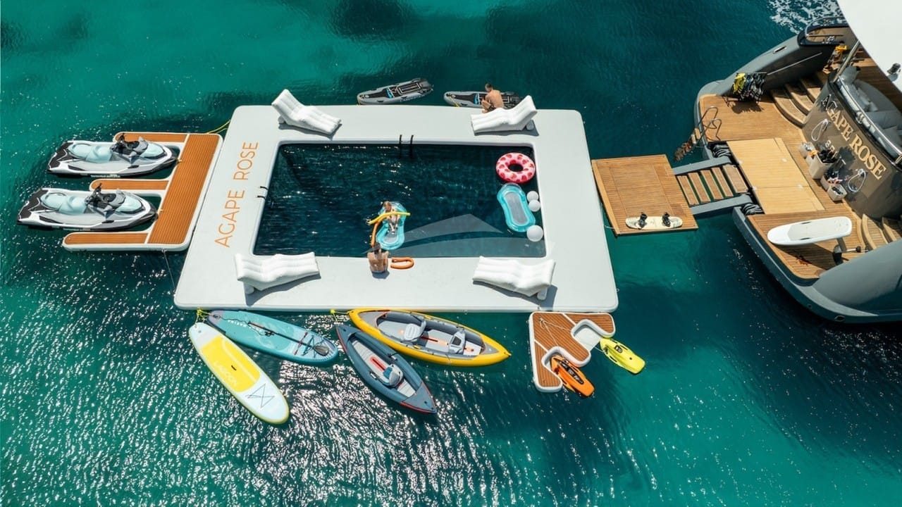 Hydrauliic swim platform, netted pool and docking pontoon