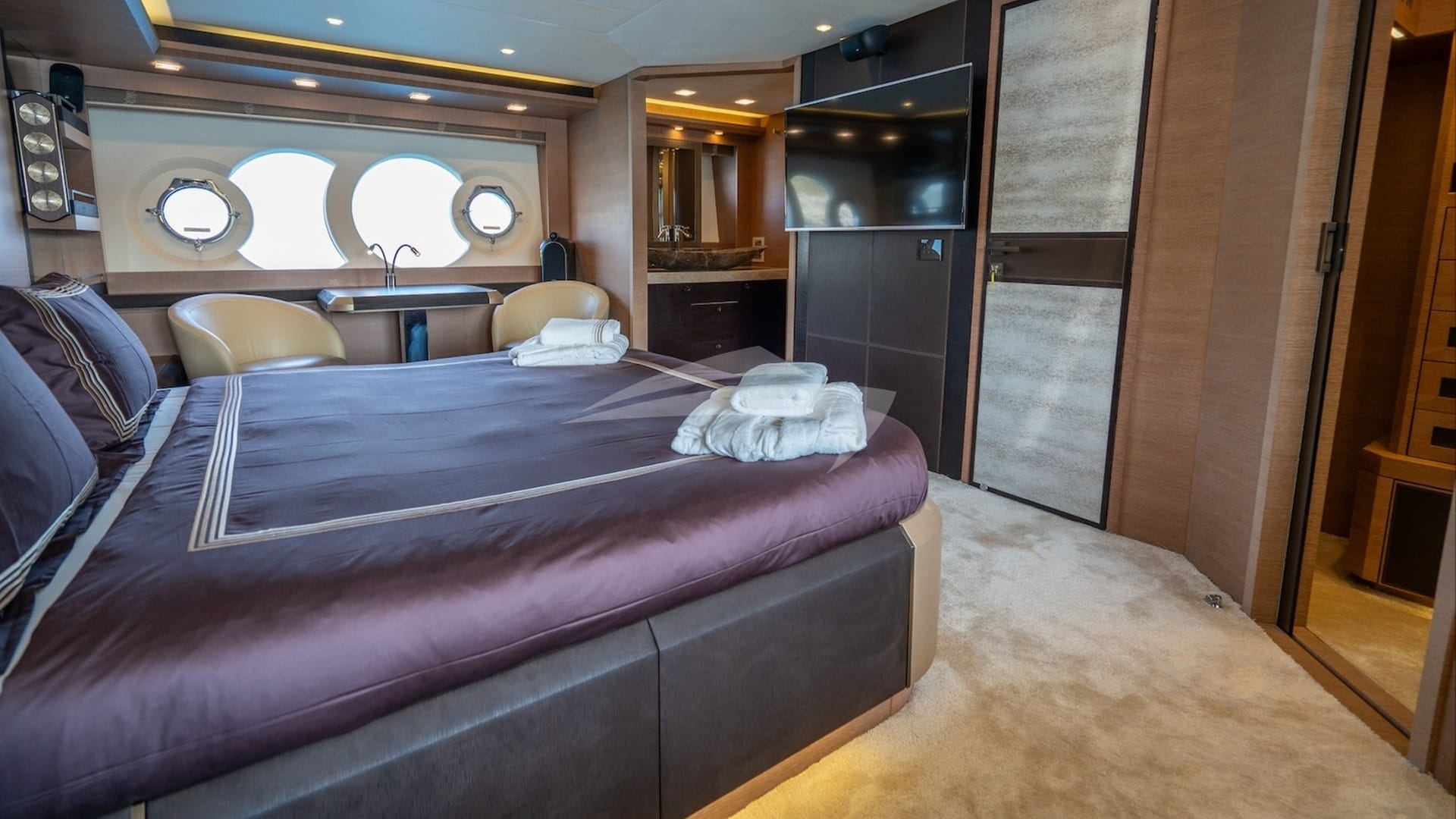 Master stateroom with large Smart TV