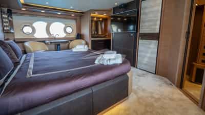Master stateroom with large Smart TV