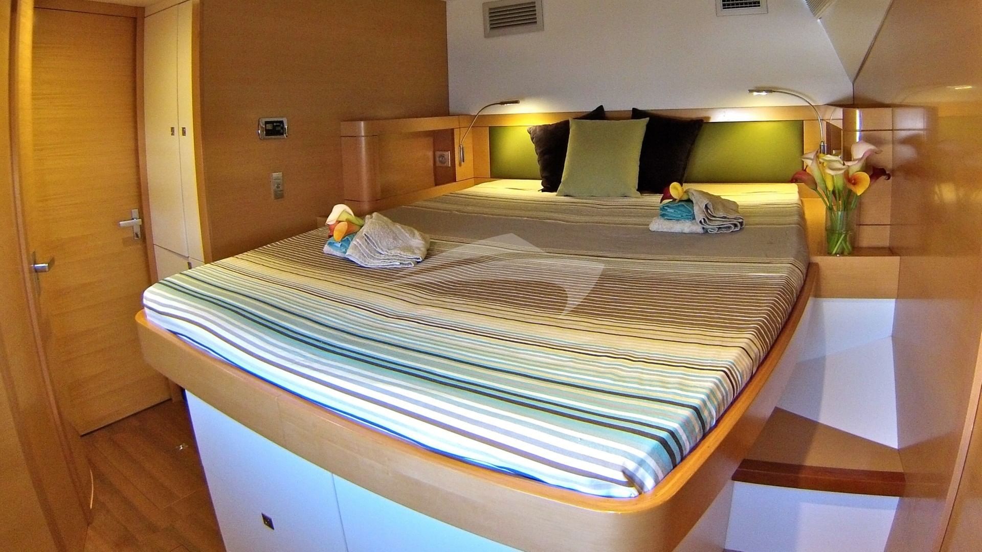 VIP stateroom with queen-sized bunk and ensuite fa