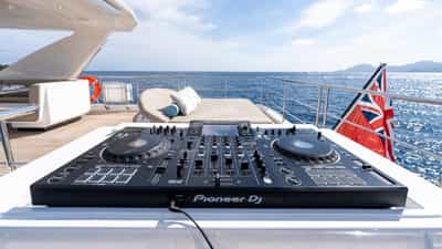 DJ booth with Pioneer XDJ-XZ integrated into full yacht Sonos system