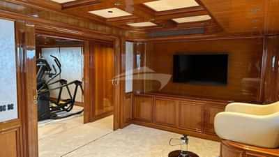 A Spa area with massage table opposite the gym, is situated between the Main Salon and the Master Suite