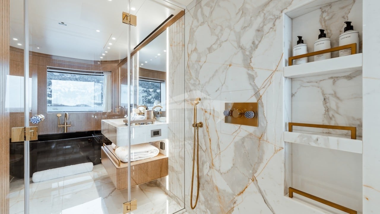 Master en suite with his and her sinks, shower and feature bath