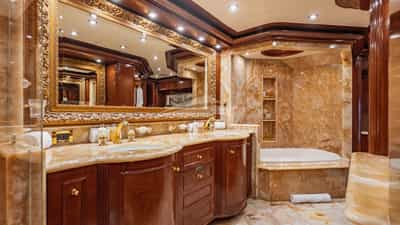 Master en suite has his and her sinks and a bath and shower