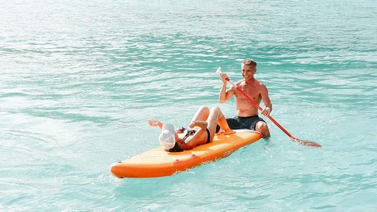 Paddleboarding available on board.