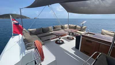 The flybridge with lounging couches and bar
