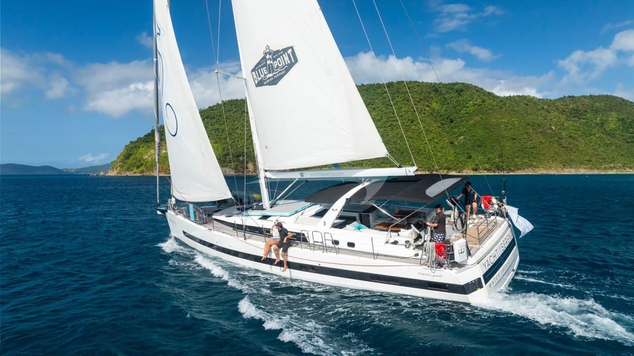 Riding the rail while sailing to Maho Bay