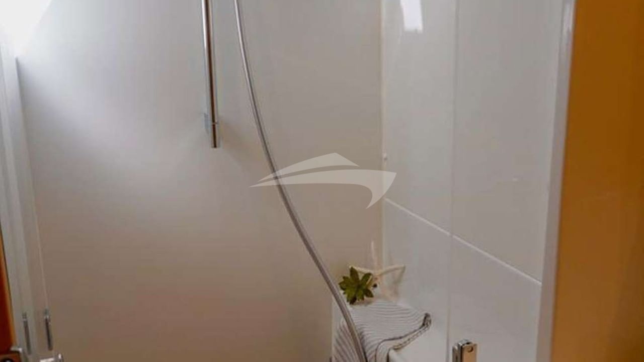 En-suite bathroom is equipped with a separate, full-size shower