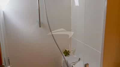 En-suite bathroom is equipped with a separate, full-size shower