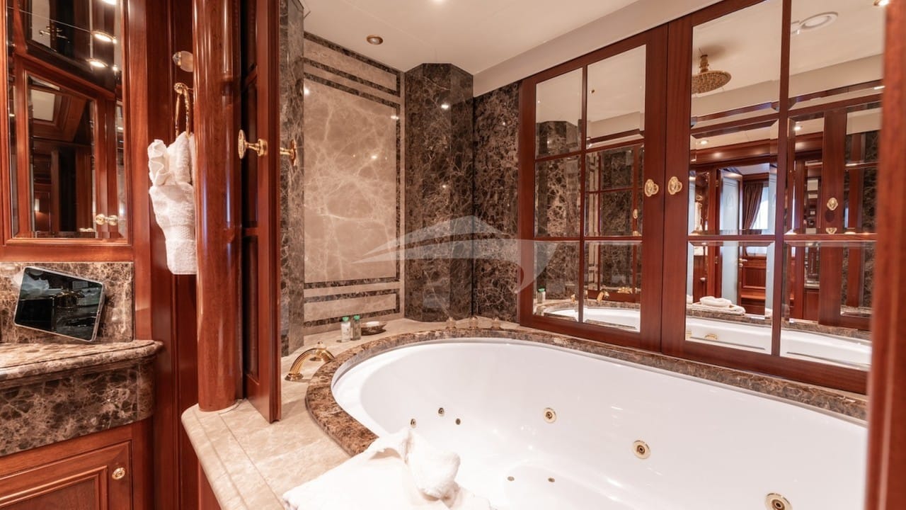 En suite has a central Jacuzzi bathtub