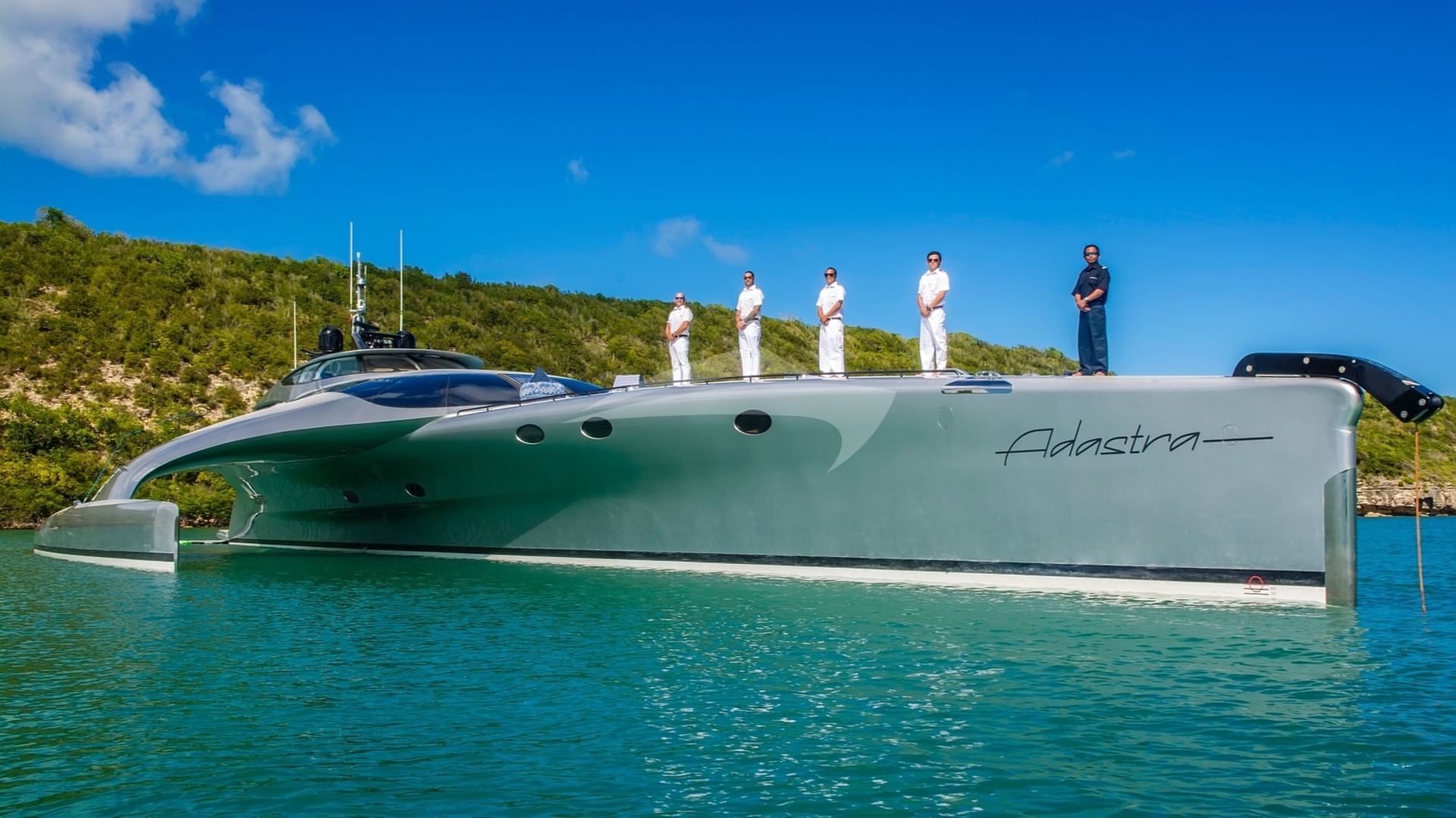 Adastra at Anchor with crew