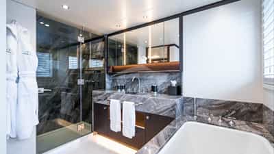 Master stateroom en suite with shower and bath