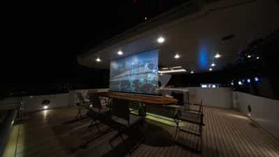 Bridge deck with 4K Ultra HD Home theatre projection screen functioning with Apple TV