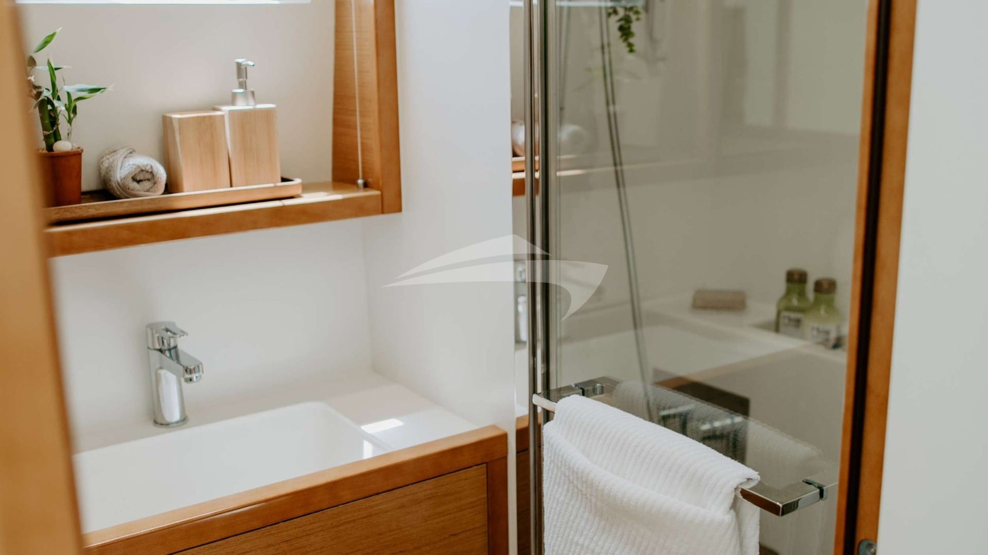 Port Aft vanity and stall shower