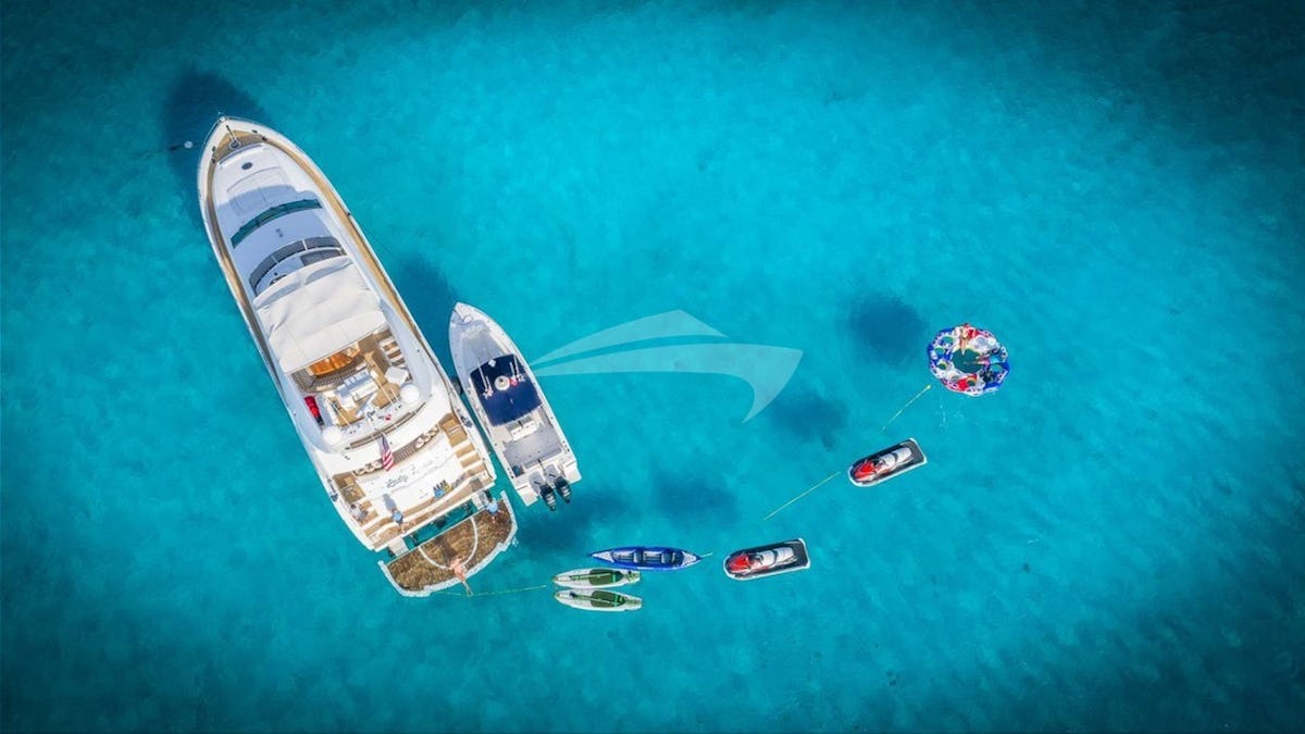 Aerial View of Yacht and Water Toys