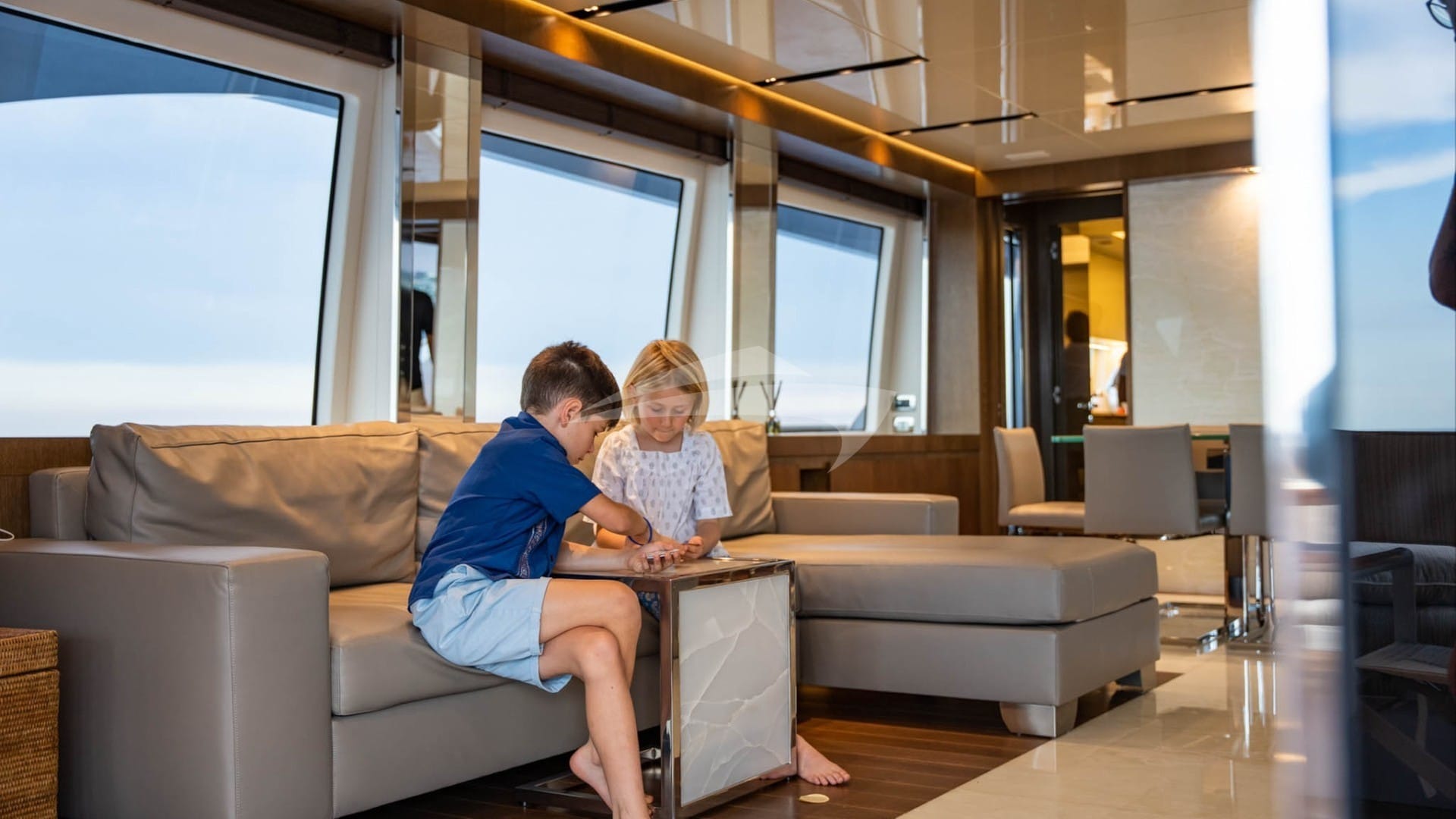 Kids playing in the main salon