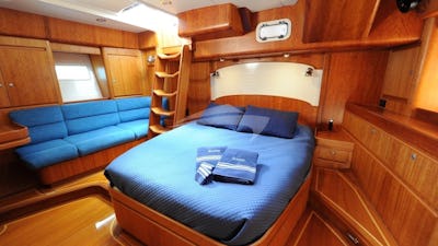 Master cabin has a King Bed has a good size settee