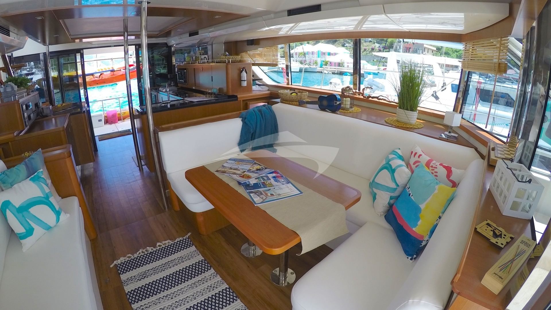 Looking aft, the saloon and on to the galley