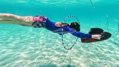 Sea scooters onthe underwater race course