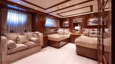 ANDROS stateroom with twin beds, plus additional pullman berth