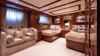 ANDROS stateroom with twin beds, plus additional pullman berth