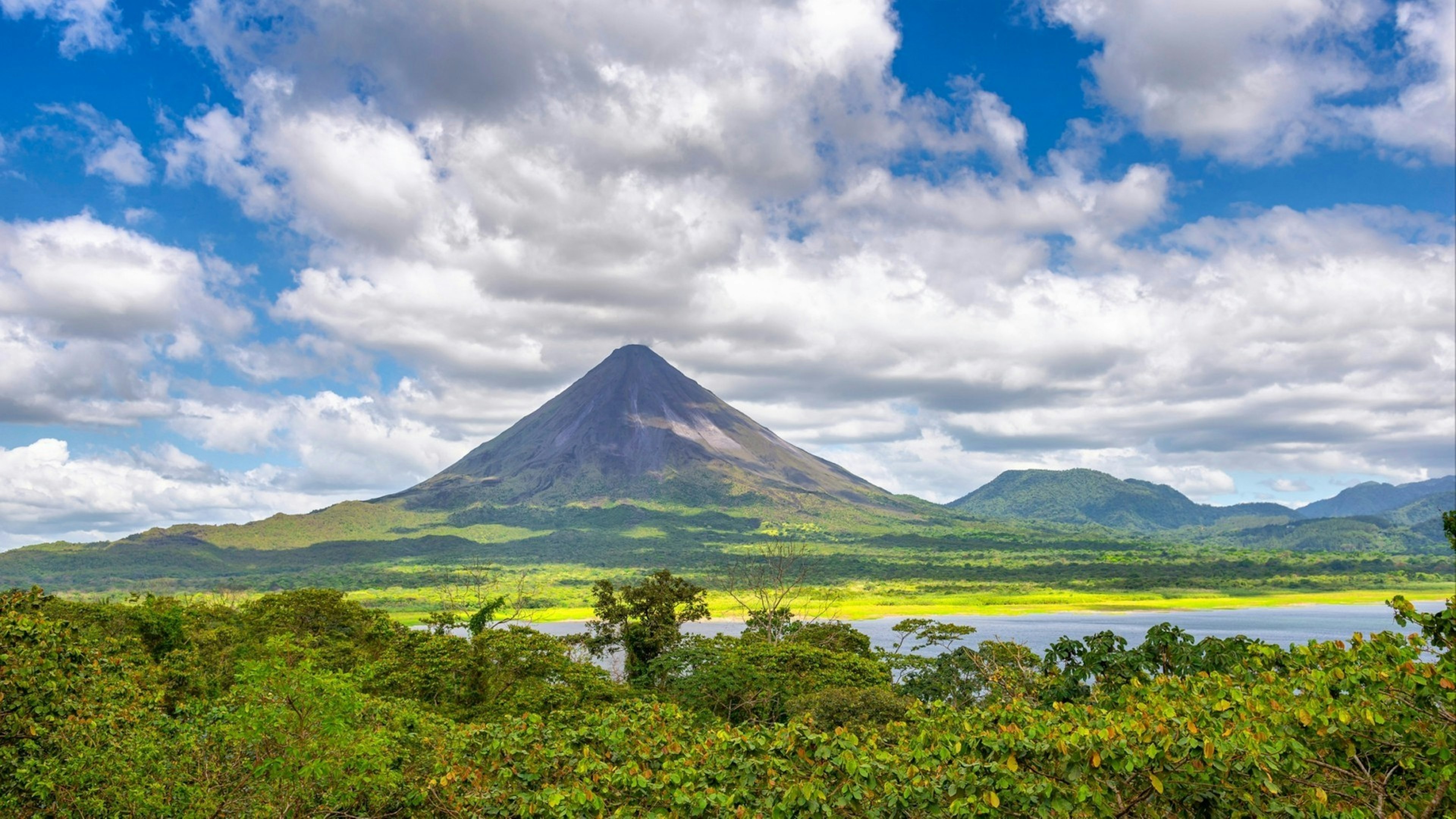 Amazing view of beautiful nature of Costa Rica with smoking volcano