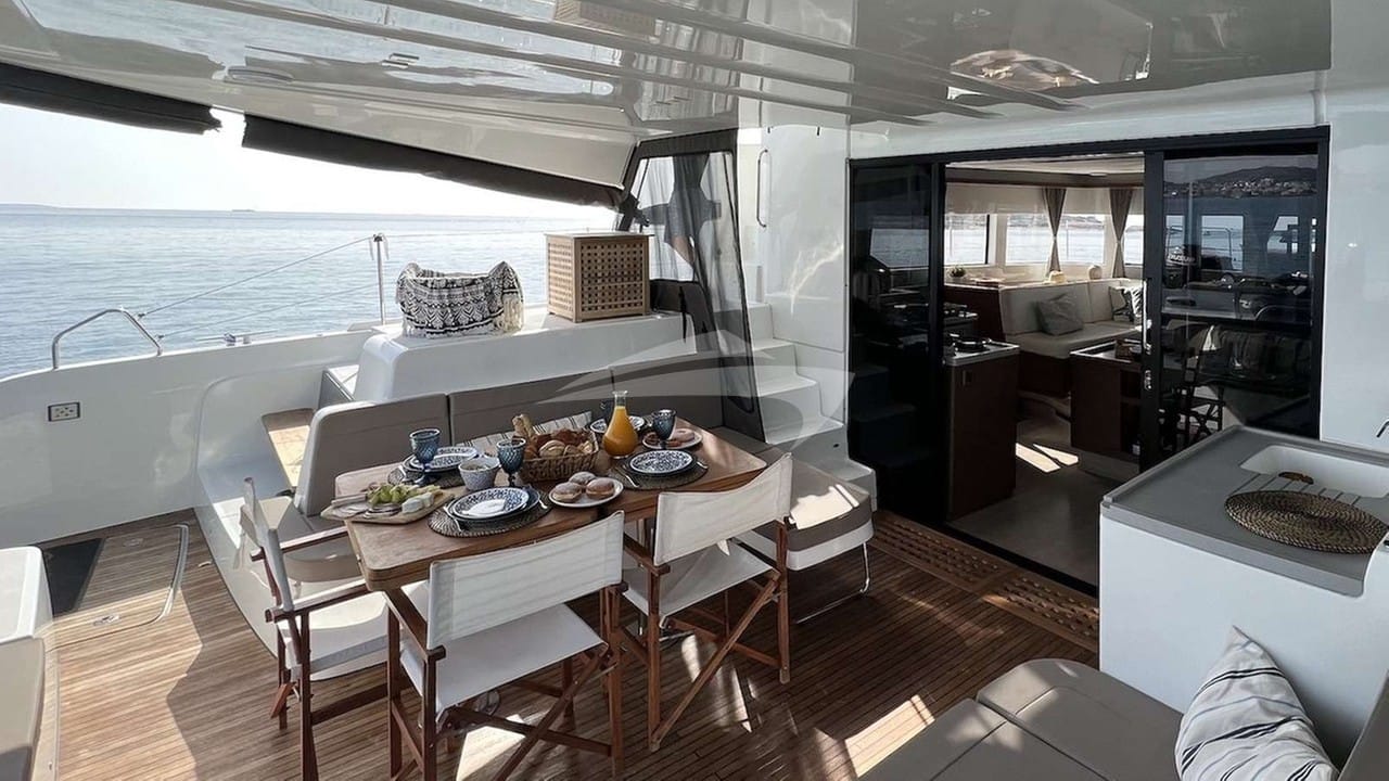 Cockpit with large teak table