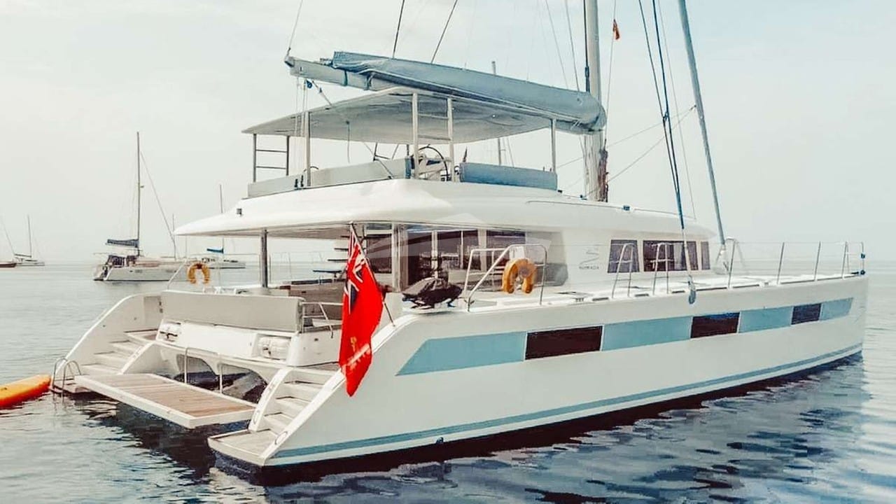 Custom features include an extra-large lowered stern platform and full-size double canvas bimini with integrated lighting
