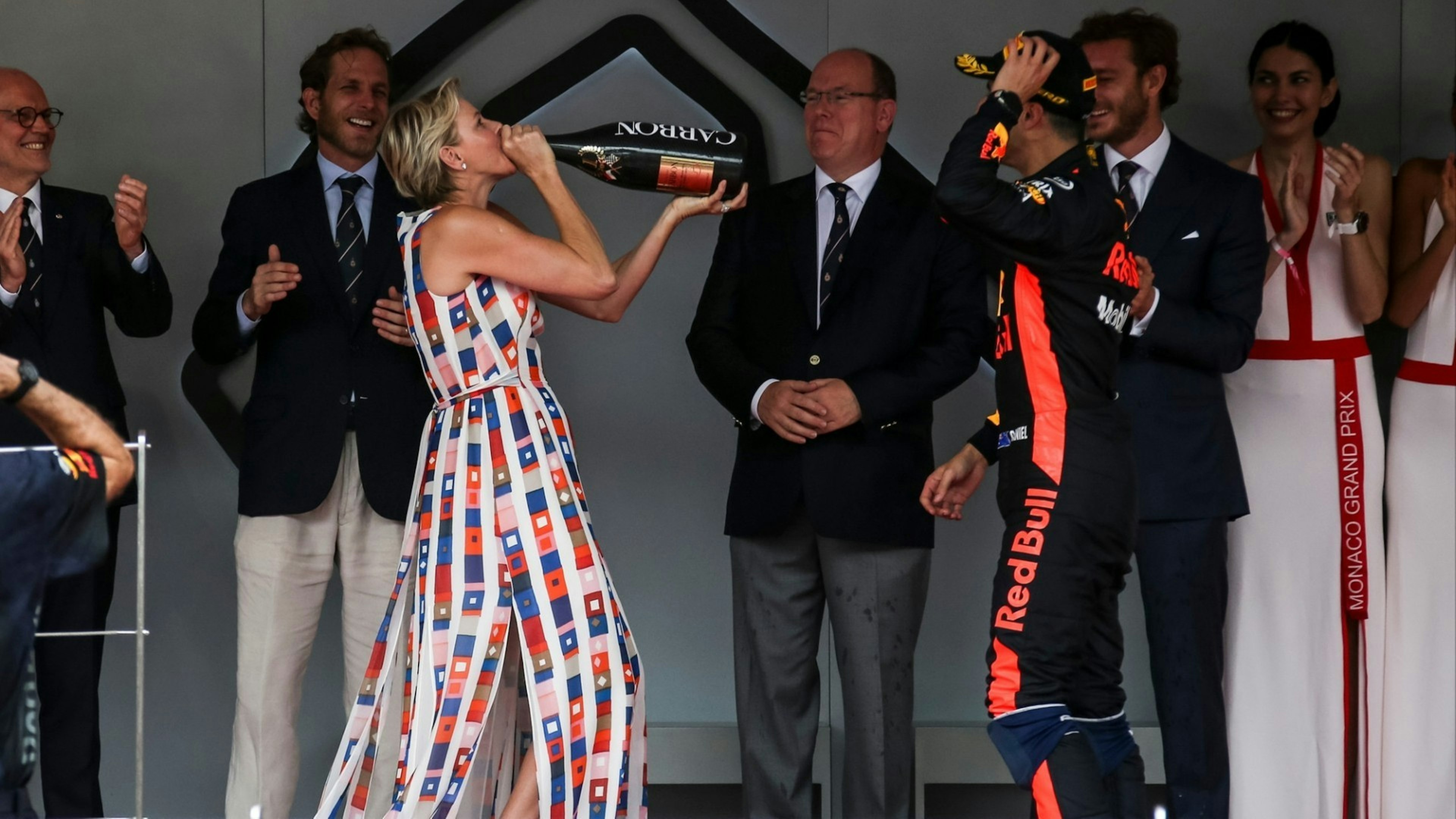 Princess Charlene of Monaco drinking champagne
