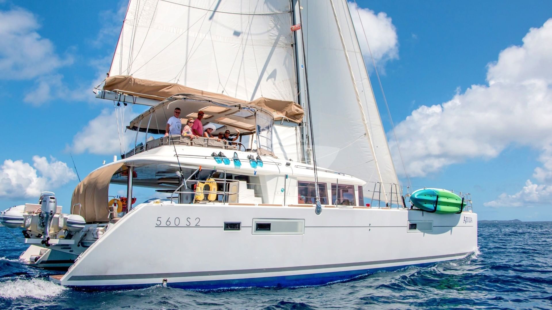 Guests enjoying sailing from the flybridge