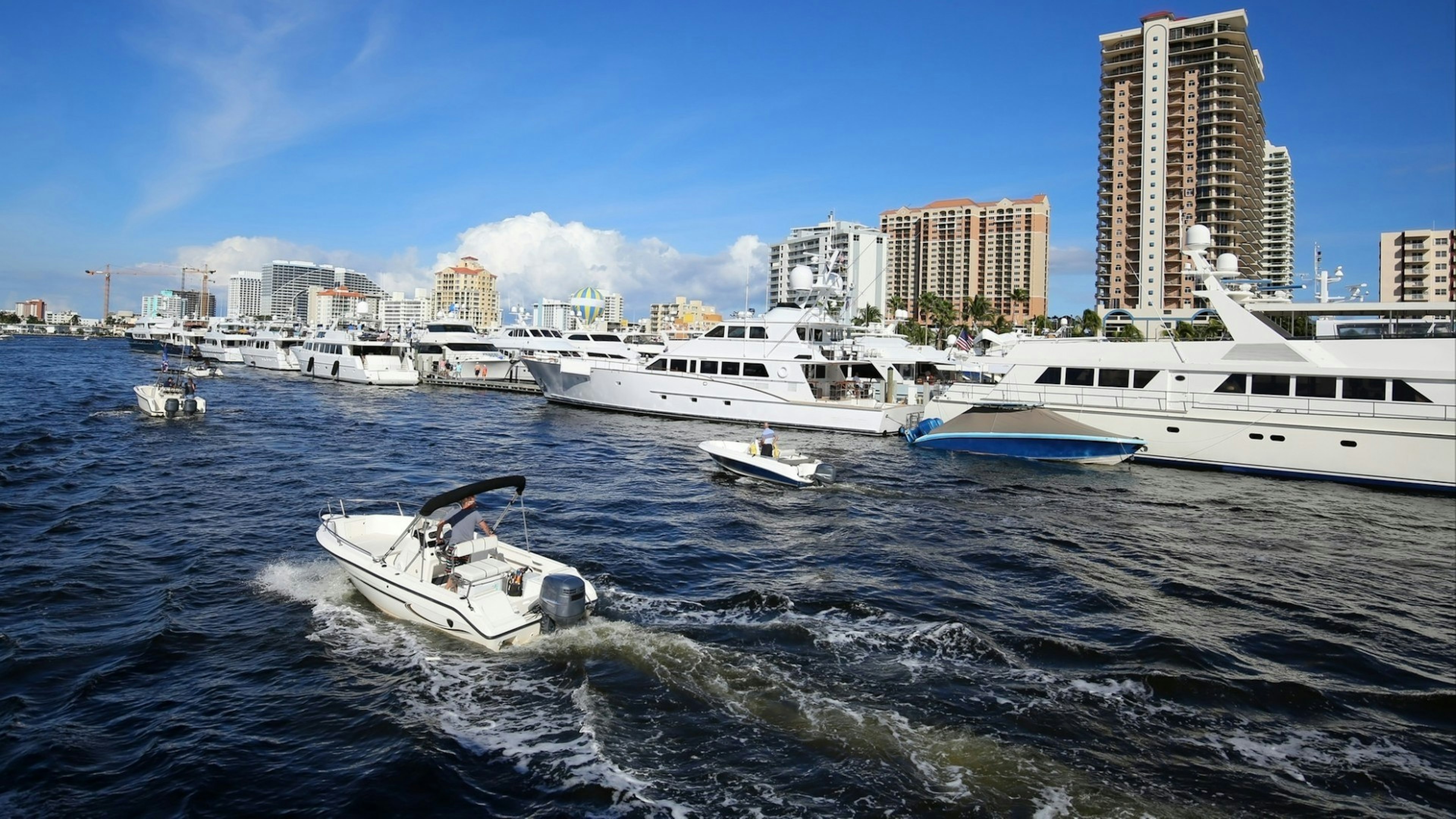 Boaters looking at boats on display at the Fort Lauderdale International Boat Show