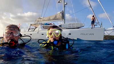 Divers surfacing