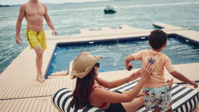 Inflatable pontoon, netted sea pool and docking platform