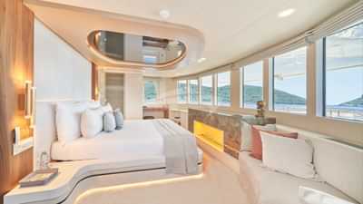 Master stateroom with king size bed, Smart TV and panoramic views from upper deck
