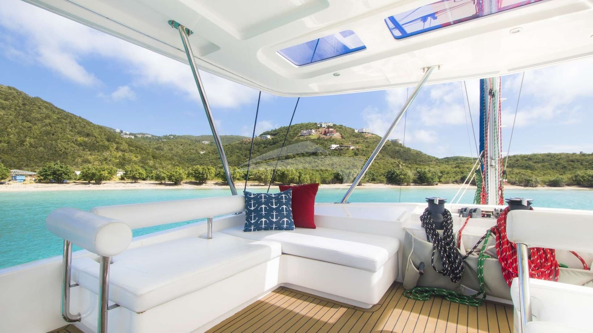 The flybridge has ample seating and provides a shaded, breezy area for happy hour.